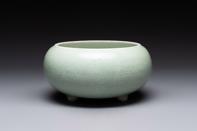 A Chinese celadon-glazed tripod censer with 'anhua' floral design, Kangxi