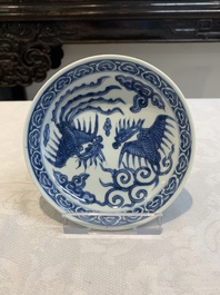 A pair of Chinese blue and white 'phoenix' plates, Wanli mark and of the period