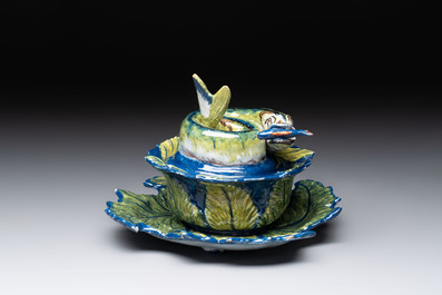 A rare polychrome Dutch Delft pike tureen and cover on stand, 18th C.