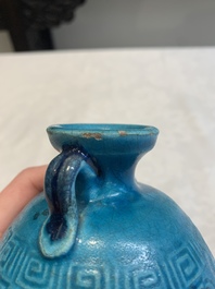 A Chinese turquoise-glazed brush rest and a Fahau vase, 18/19th C.