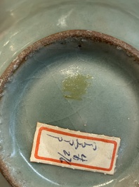 Three Chinese Longquan celadon saucers and an archaistic ge-type vase, Ming/Qing