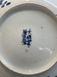 A pair of Chinese blue and white 'phoenix' plates, Wanli mark and of the period