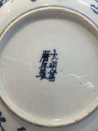 A pair of Chinese blue and white 'phoenix' plates, Wanli mark and of the period