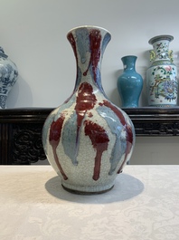 A Chinese flamb&eacute;-glazed ge-type-ground bottle vase, 19th C.