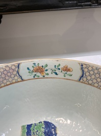 A fine Chinese famille rose bowl with figures, flowers and pheasants, Yongzheng/Qianlong