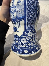 A pair of Chinese blue and white 'gu' vases with floral design, Kangxi