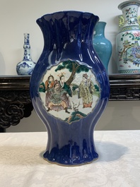A pair of Chinese famille verte blue-ground lobed vases with figural design, 19th C.