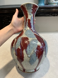 A Chinese flamb&eacute;-glazed ge-type-ground bottle vase, 19th C.