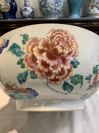 A fine Chinese famille rose bowl with figures, flowers and pheasants, Yongzheng/Qianlong