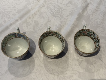 14 Chinese Canton famille rose 'Wu Shuang Pu-style' cups and saucers, 19th C.