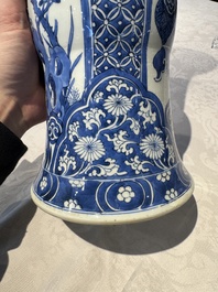 A pair of Chinese blue and white 'gu' vases with floral design, Kangxi