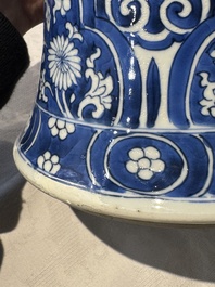 A pair of Chinese blue and white 'gu' vases with floral design, Kangxi