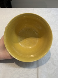 A Chinese yellow-glazed 'anhua' 'carp and lotus' bowl, Kangxi mark, 19th C.