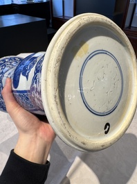 A pair of Chinese blue and white 'gu' vases with floral design, Kangxi