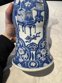 A pair of Chinese blue and white 'gu' vases with floral design, Kangxi