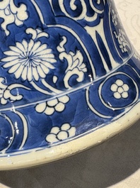 A pair of Chinese blue and white 'gu' vases with floral design, Kangxi