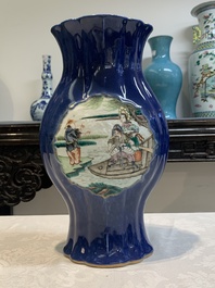 A pair of Chinese famille verte blue-ground lobed vases with figural design, 19th C.