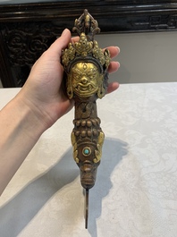 A Tibetan turquoise-inlaid copper alloy ritual kartika, 18/19th C.