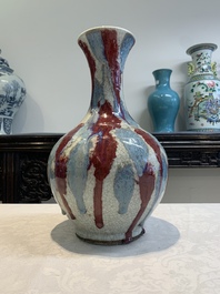 A Chinese flamb&eacute;-glazed ge-type-ground bottle vase, 19th C.