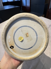 A pair of Chinese blue and white 'gu' vases with floral design, Kangxi