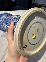 A pair of Chinese blue and white 'gu' vases with floral design, Kangxi