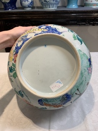 A fine Chinese famille rose bowl with figures, flowers and pheasants, Yongzheng/Qianlong