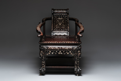 A Chinese mother-of-pearl-inlaid hongmu reclining armchair with a retractable footrest, Canton, 19th C.