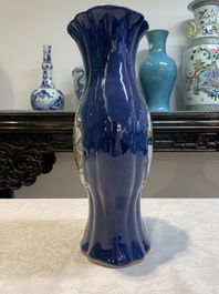 A pair of Chinese famille verte blue-ground lobed vases with figural design, 19th C.