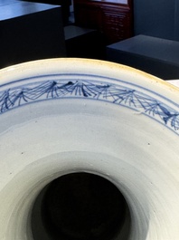 A pair of Chinese blue and white 'gu' vases with floral design, Kangxi