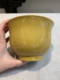 A Chinese yellow-glazed 'anhua' 'carp and lotus' bowl, Kangxi mark, 19th C.