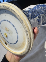 A pair of Chinese blue and white 'gu' vases with floral design, Kangxi