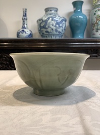 A Chinese Longquan celadon 'gu' vase with 'anhua' floral design and a bowl, Ming