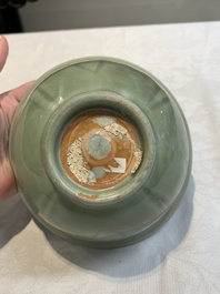 A Chinese Longquan celadon 'gu' vase with 'anhua' floral design and a bowl, Ming
