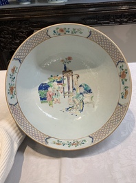 A fine Chinese famille rose bowl with figures, flowers and pheasants, Yongzheng/Qianlong