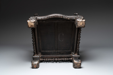 A richly carved Chinese lacquered hongmu armchair, Canton, 19th C.