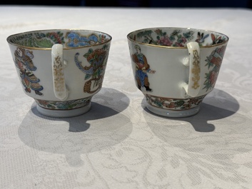 14 Chinese Canton famille rose 'Wu Shuang Pu-style' cups and saucers, 19th C.