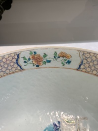 A fine Chinese famille rose bowl with figures, flowers and pheasants, Yongzheng/Qianlong