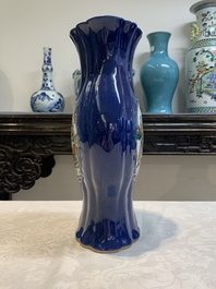 A pair of Chinese famille verte blue-ground lobed vases with figural design, 19th C.