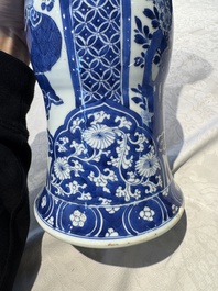 A pair of Chinese blue and white 'gu' vases with floral design, Kangxi