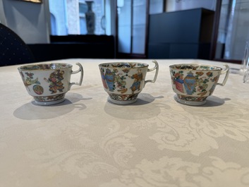 14 Chinese Canton famille rose 'Wu Shuang Pu-style' cups and saucers, 19th C.