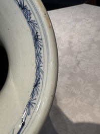 A pair of Chinese blue and white 'gu' vases with floral design, Kangxi