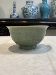 A Chinese Longquan celadon 'gu' vase with 'anhua' floral design and a bowl, Ming