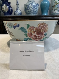 A fine Chinese famille rose bowl with figures, flowers and pheasants, Yongzheng/Qianlong