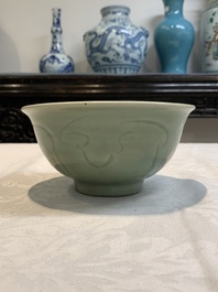 A Chinese Longquan celadon 'gu' vase with 'anhua' floral design and a bowl, Ming
