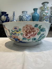A fine Chinese famille rose bowl with figures, flowers and pheasants, Yongzheng/Qianlong