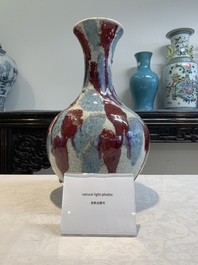 A Chinese flamb&eacute;-glazed ge-type-ground bottle vase, 19th C.
