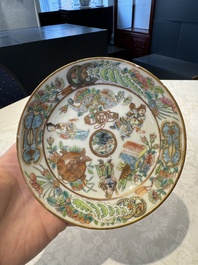 14 Chinese Canton famille rose 'Wu Shuang Pu-style' cups and saucers, 19th C.
