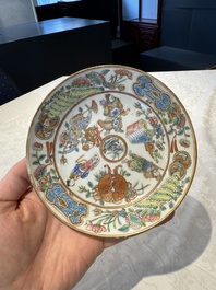 14 Chinese Canton famille rose 'Wu Shuang Pu-style' cups and saucers, 19th C.