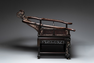 A Chinese mother-of-pearl-inlaid hongmu reclining armchair with a retractable footrest, Canton, 19th C.