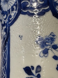 A pair of Chinese blue and white 'gu' vases with floral design, Kangxi